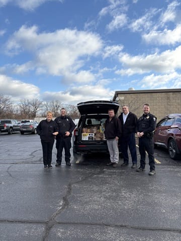 National Flight Services joined forces with the Ottawa Hills Police Department for the No-Shave November campaign to collect food items..